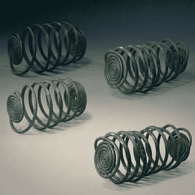 Bronze Age coiled wire objects circa 4000 BC early helical coil forms