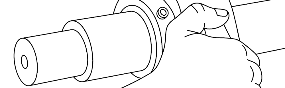 Hands adjusting pillow block bearing position by hand before final bolt torque